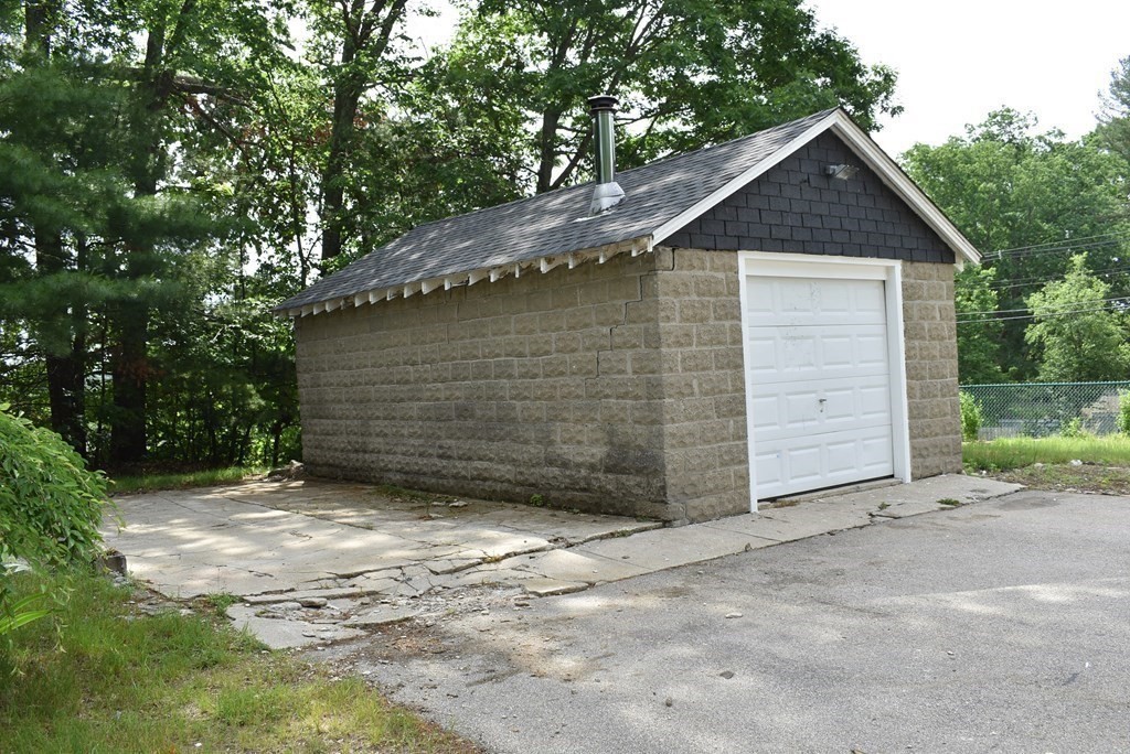 371 Worcester Road Charlton, MA 01507 - Photo 7 of 35 a front view of a house with a yard