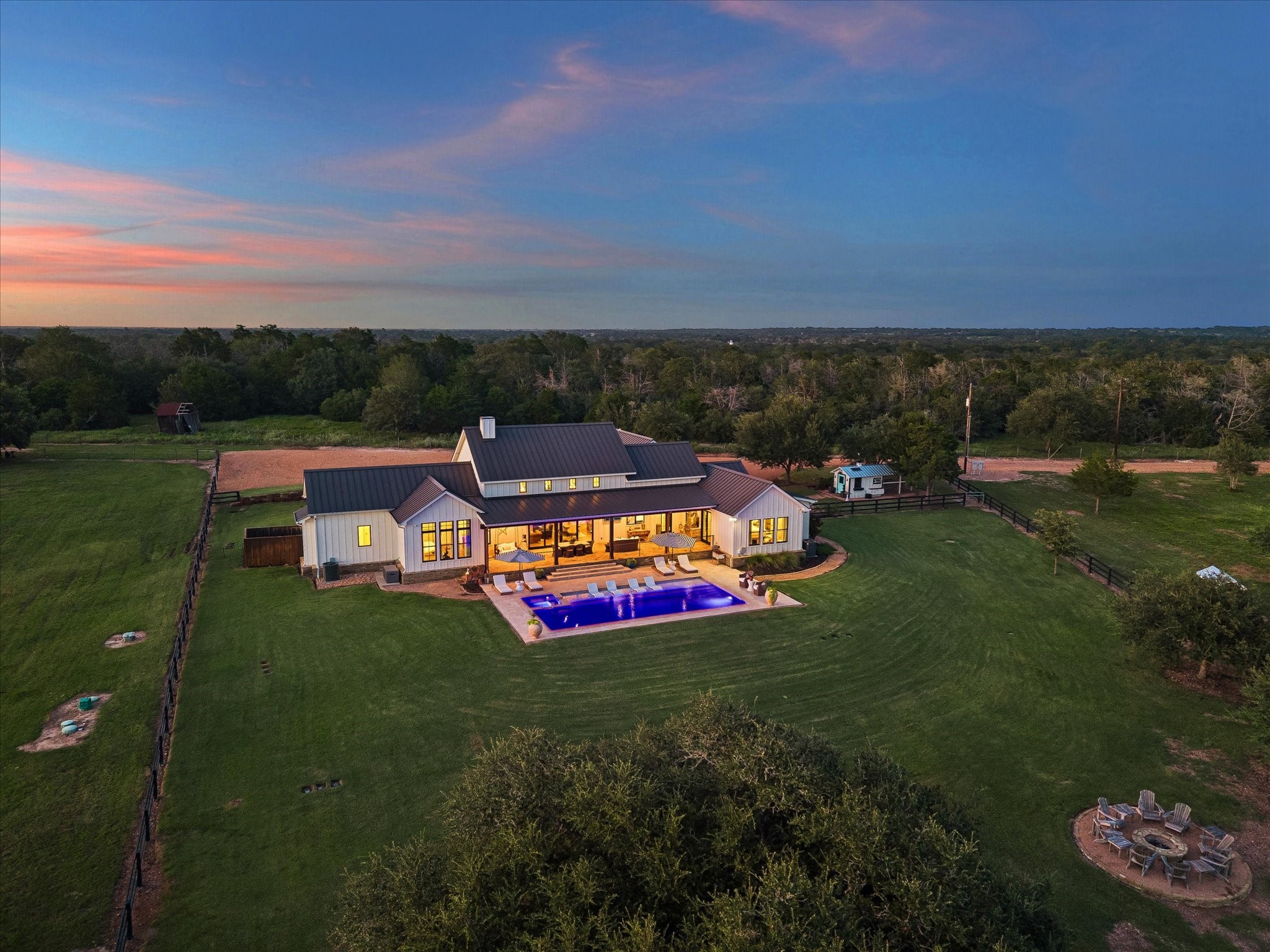 1600 South Weyand Road Round Top, TX 78954 - Photo 45 of 50 Aerial view of the rear of home and yard.