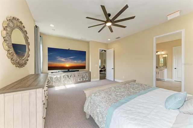 an aerial view of residential houses with outdoor space and swimming pool
