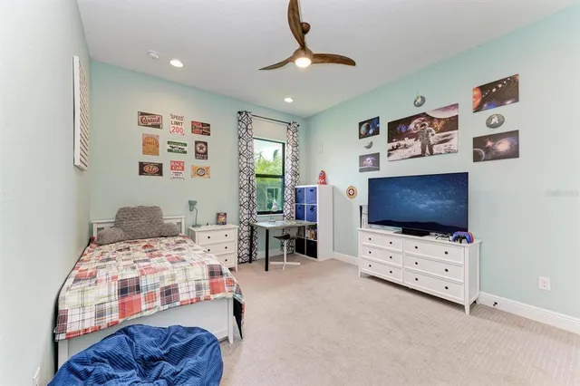a view of a garden with lawn chairs