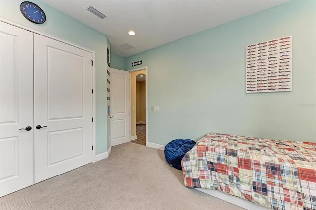 a view of a lake with a building in the background