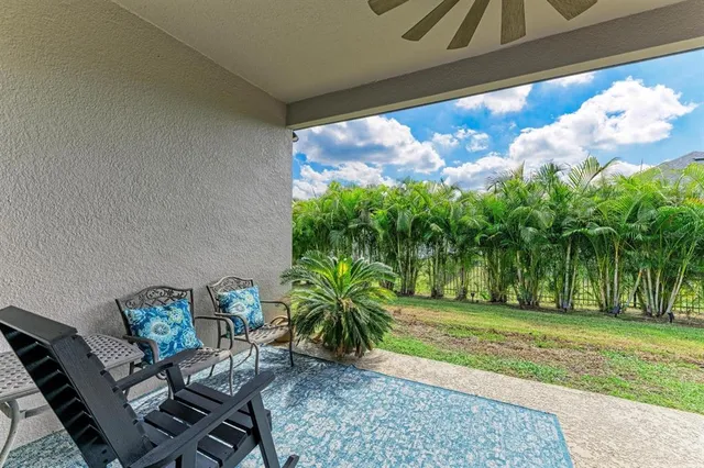 a kitchen with a sink and large window