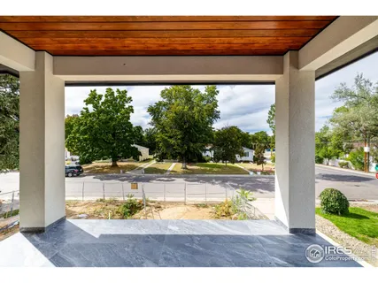 a view of swimming pool from a window