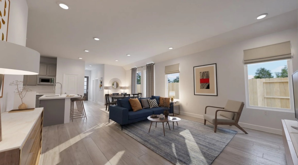 16558 Timberwolf Trail New Caney, TX 77357 - Photo 3 of 17 a living room with furniture and a large window