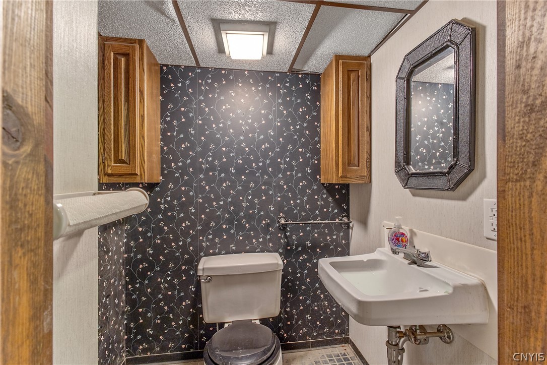 112 Winthrop Road Syracuse, NY 13206 - Photo 35 of 42 Charming Basement Half Bath with Classic Details &