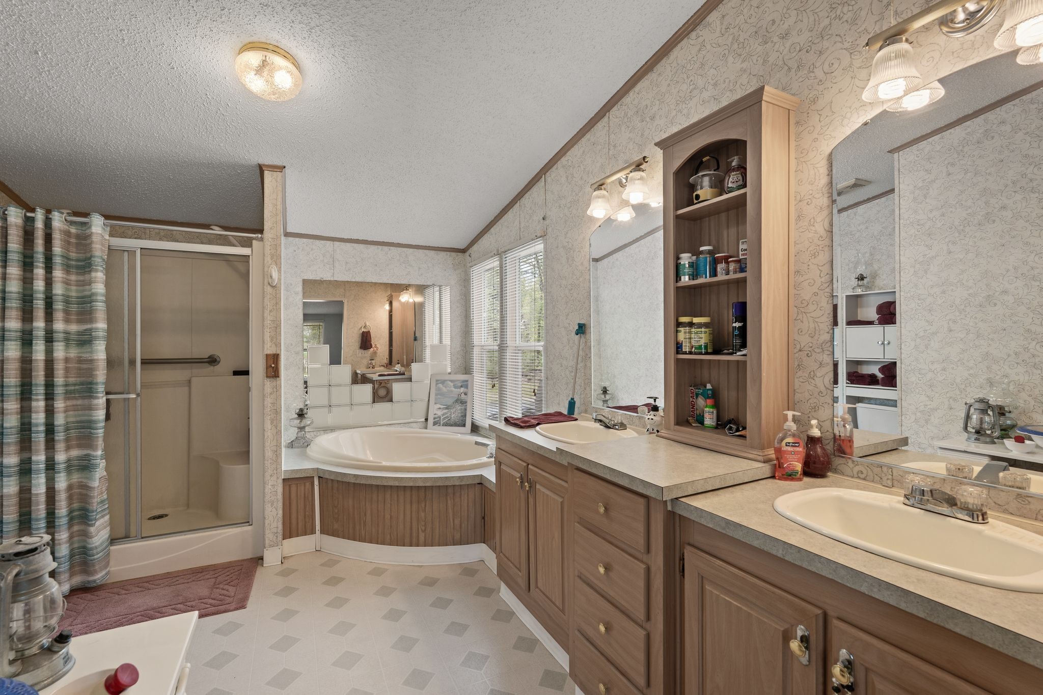 2636 Balthrop Road Pleasant View, TN 37146 - Photo 18 of 63 a room with a sink a vanity and shower