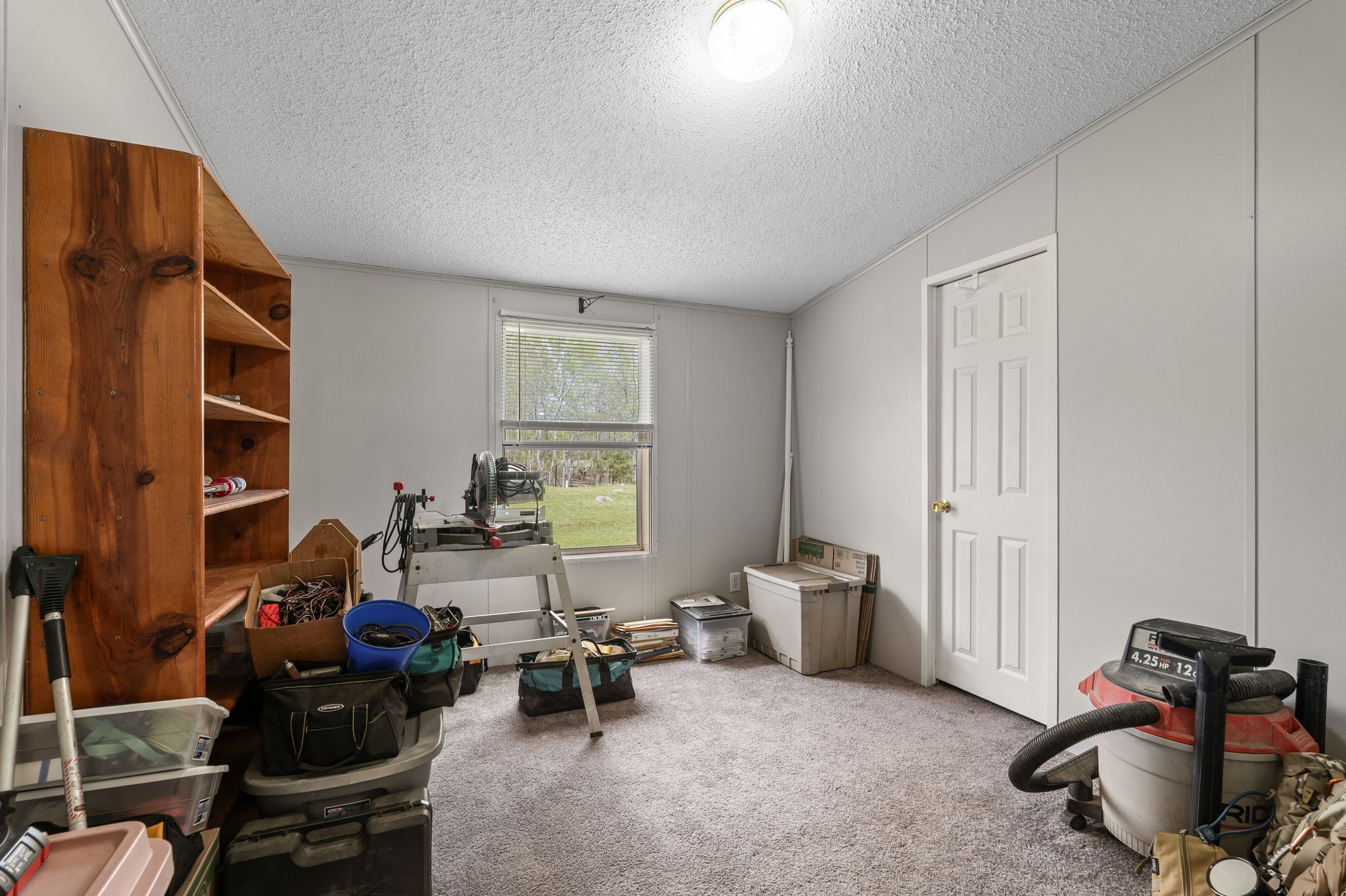 2636 Balthrop Road Pleasant View, TN 37146 - Photo 19 of 63 a living room with furniture and a window