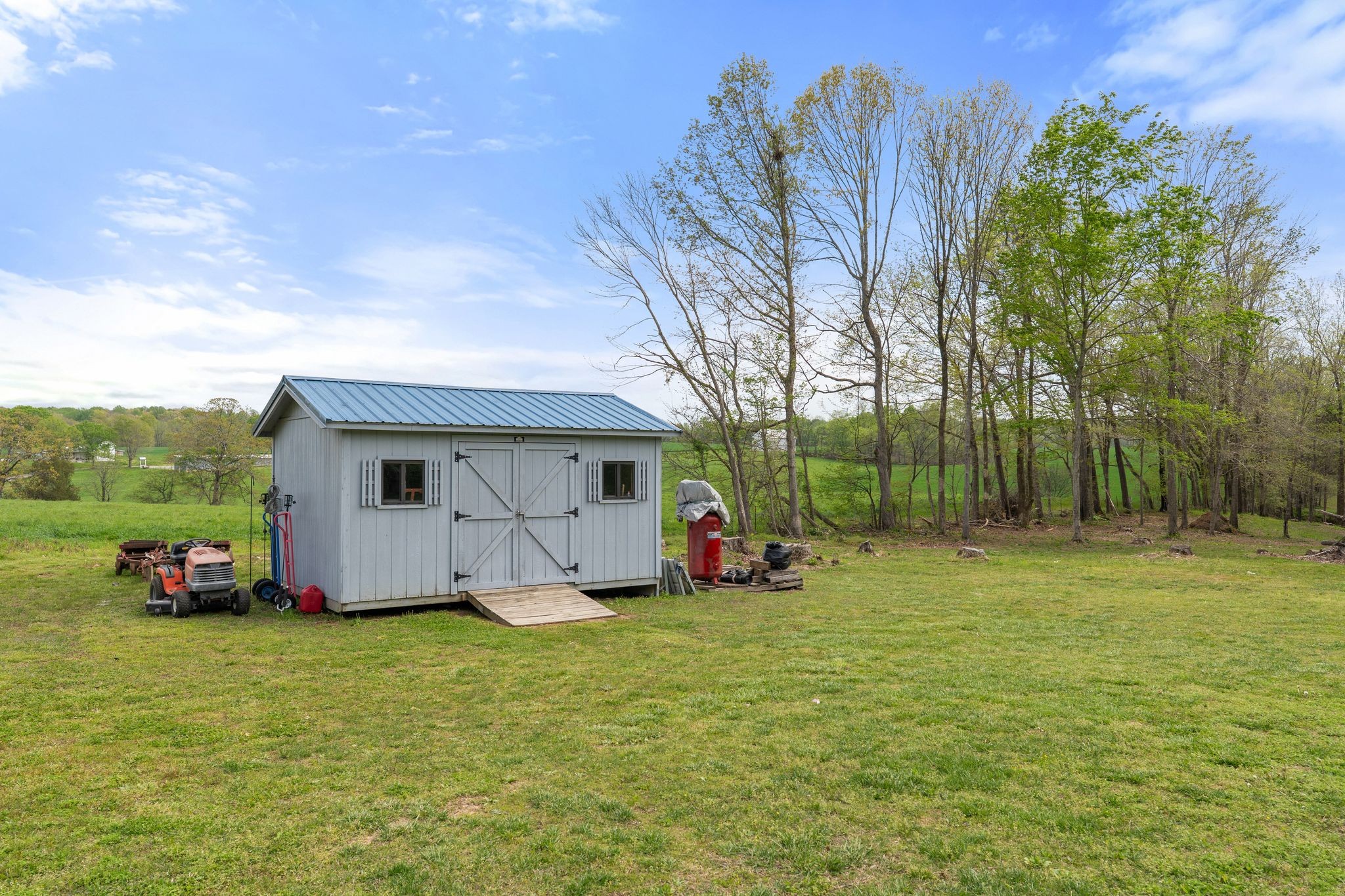 2636 Balthrop Road Pleasant View, TN 37146 - Photo 24 of 63 a view of a backyard with parked area