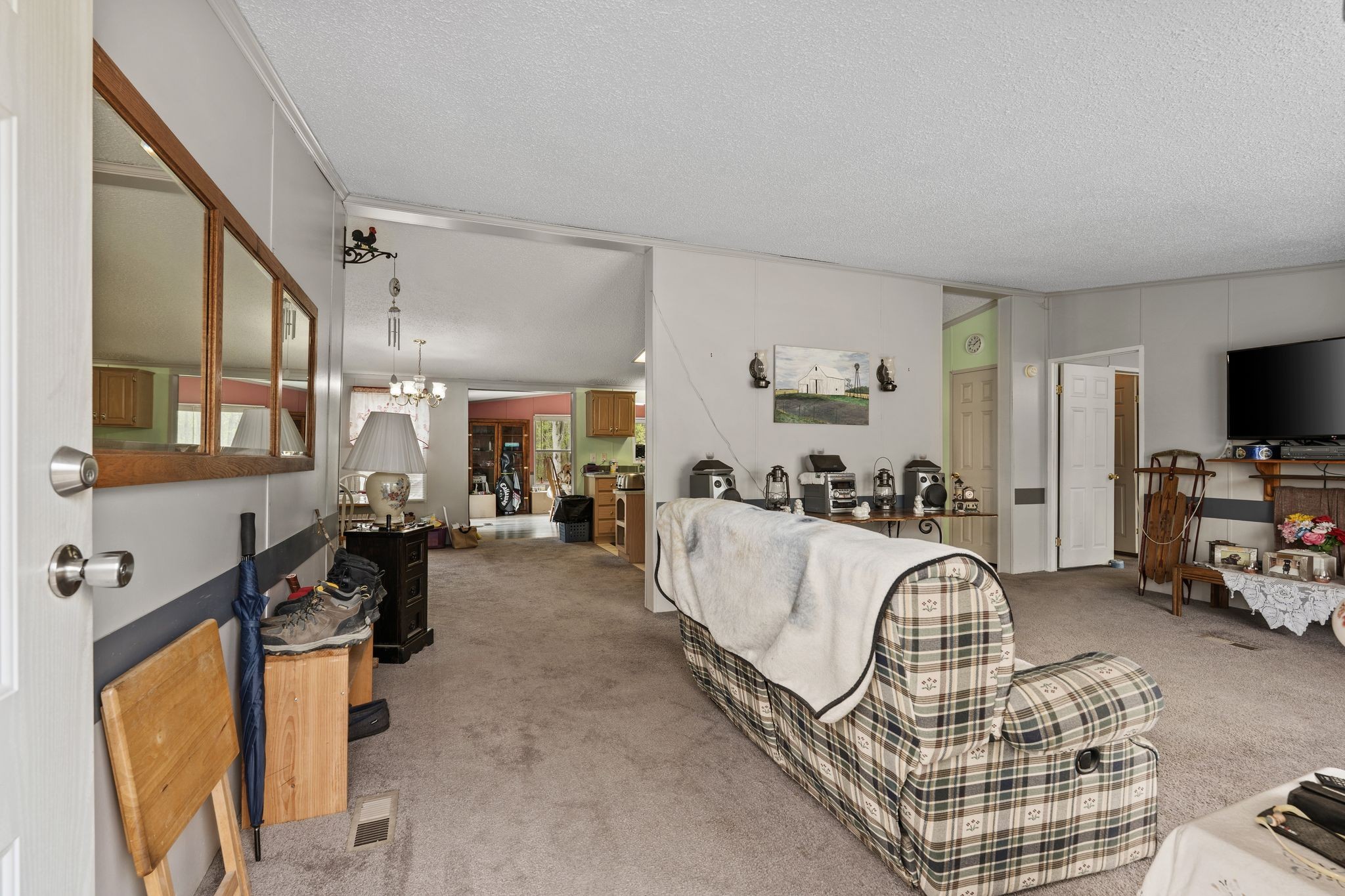 2636 Balthrop Road Pleasant View, TN 37146 - Photo 9 of 63 a living room with furniture a flat screen tv and a window