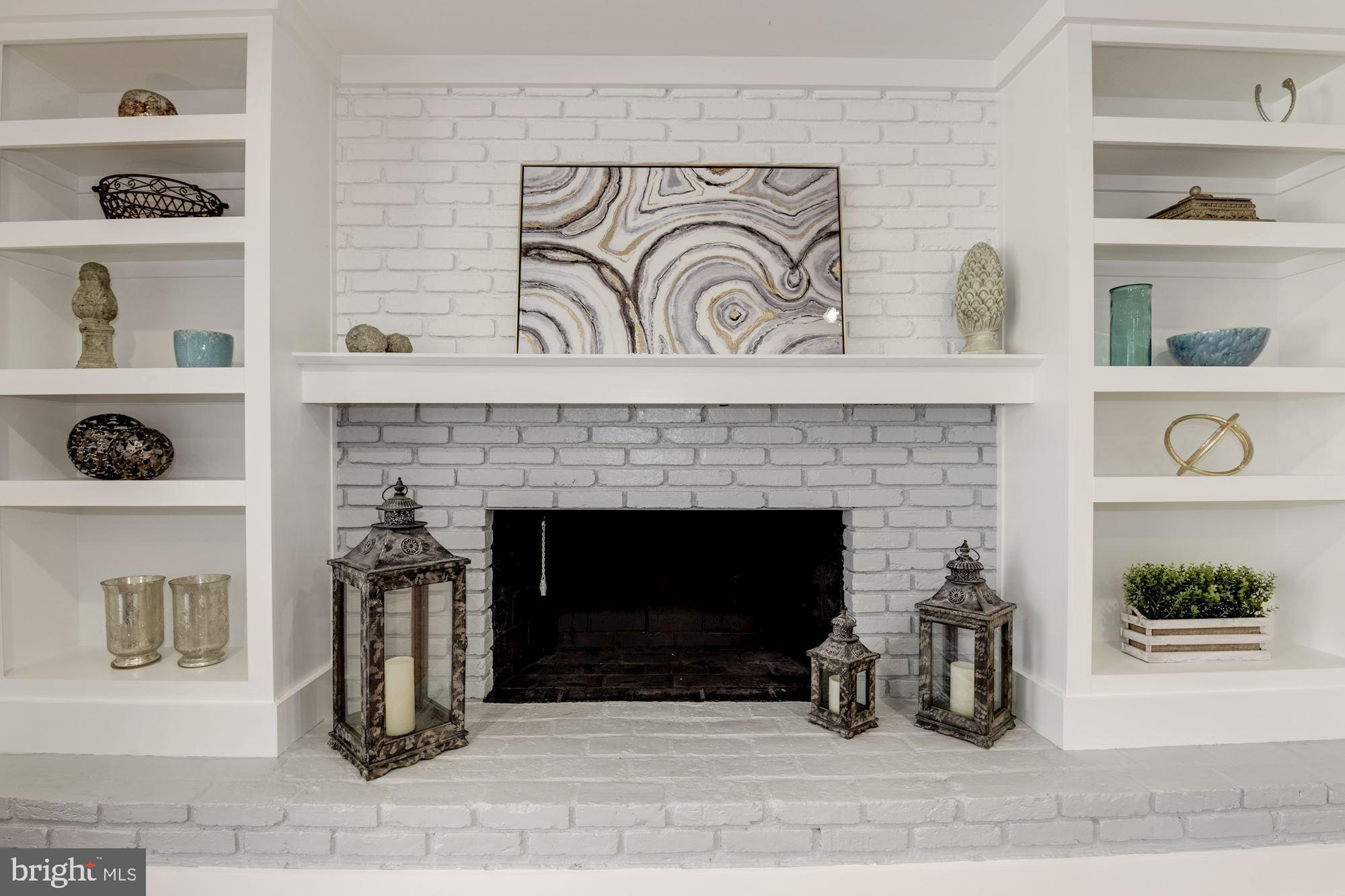 10526 Hunters Valley Road Vienna, VA 22181 - Photo 17 of 59 Brick Fireplace with Custom Shelving
