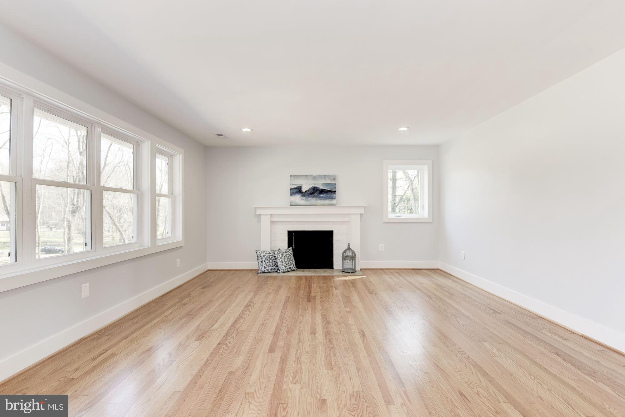10526 Hunters Valley Road Vienna, VA 22181 - Photo 21 of 59 Master Suite with Wall of Windows & Fireplace