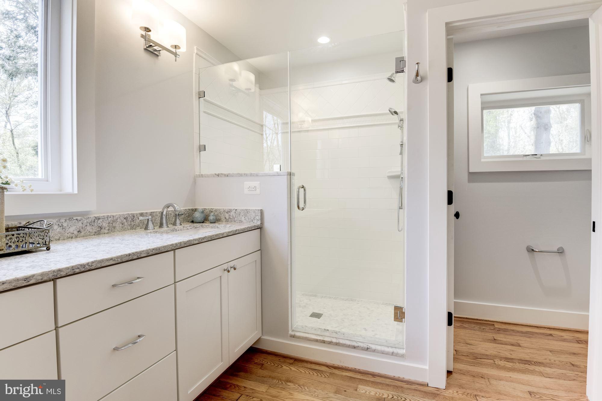 10526 Hunters Valley Road Vienna, VA 22181 - Photo 27 of 59 Master Bathroom with Glass Shower & Sep Toilet Rm
