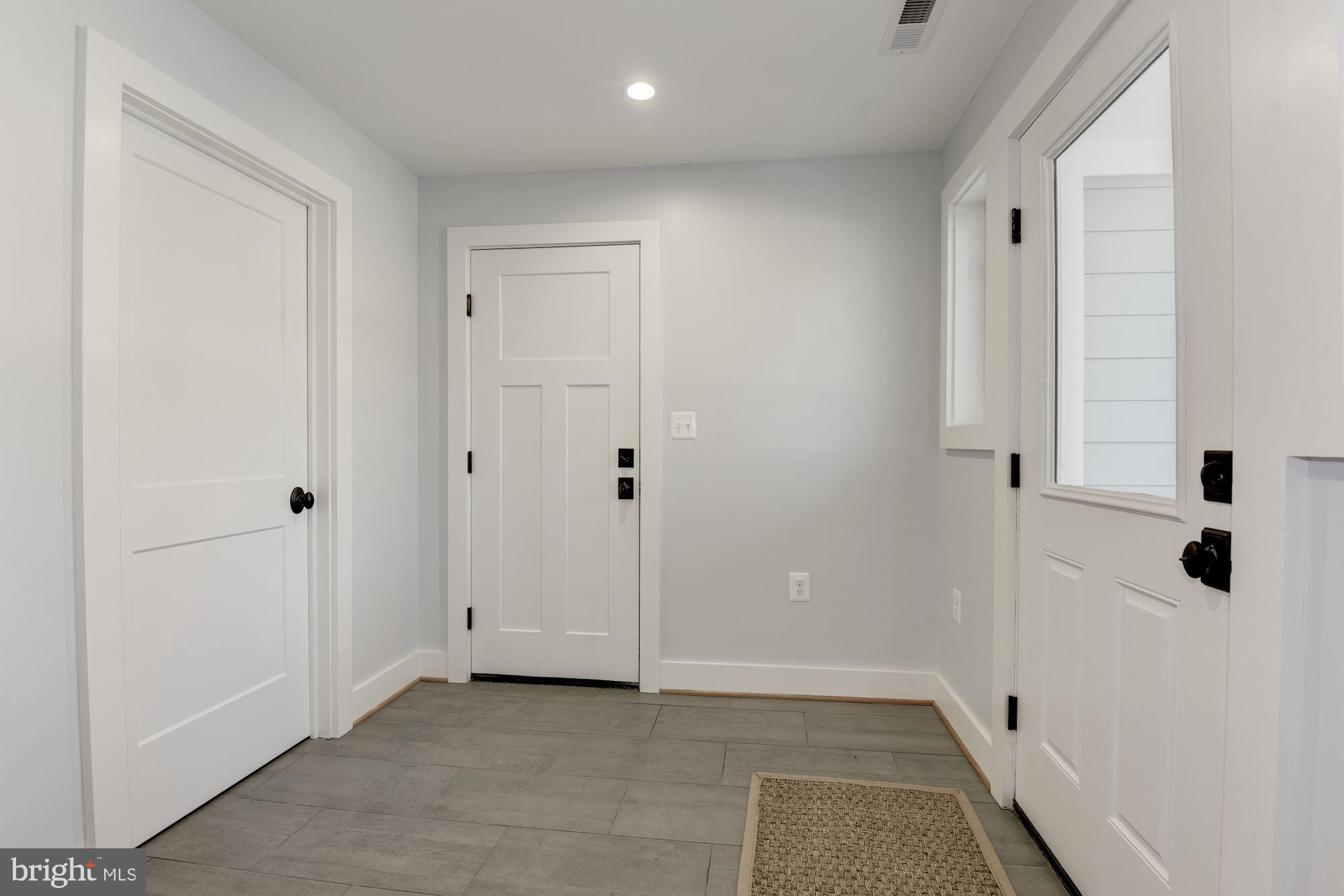 10526 Hunters Valley Road Vienna, VA 22181 - Photo 38 of 59 Mud Room with Entry to Covered Stoop