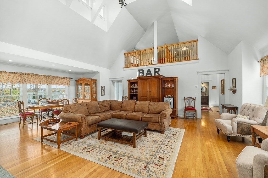34 Decatur Street Gloucester, MA 01930 - Photo 11 of 31 a living room with furniture and a table