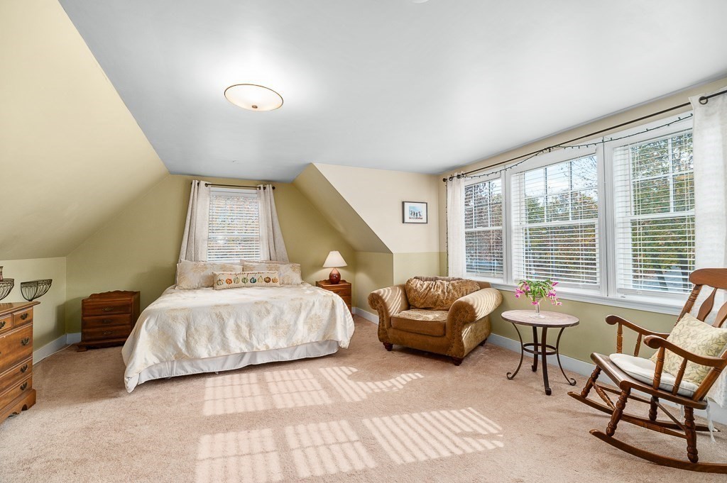 34 Decatur Street Gloucester, MA 01930 - Photo 23 of 31 a bedroom with furniture and a large window