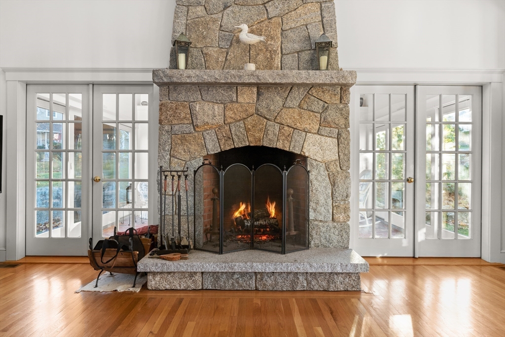 34 Decatur Street Gloucester, MA 01930 - Photo 8 of 31 a living room with furniture and a fireplace