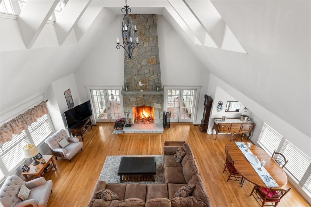 34 Decatur Street Gloucester, MA 01930 - Photo 9 of 31 a living room with furniture fireplace and flat screen tv