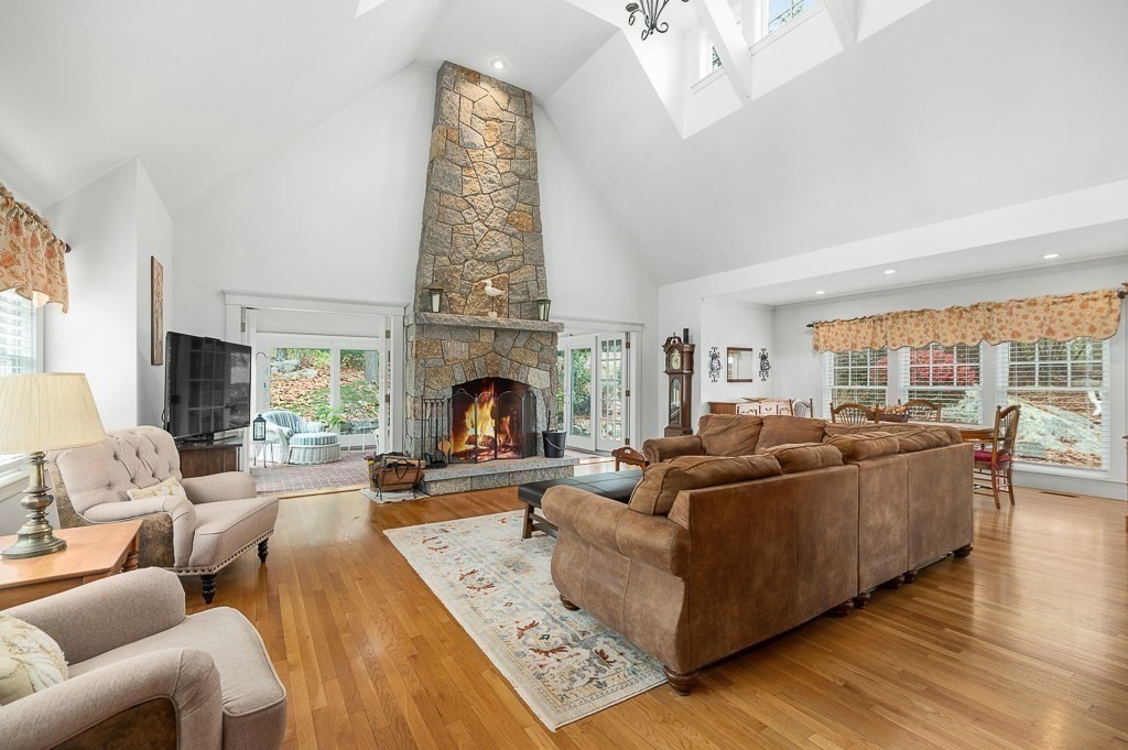34 Decatur Street Gloucester, MA 01930 - Photo 10 of 31 a living room with furniture and a fireplace