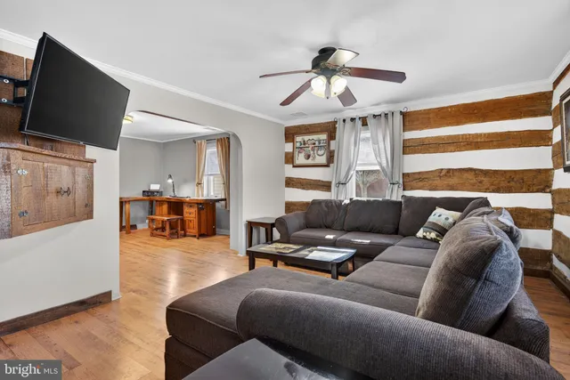 a kitchen with stainless steel appliances granite countertop a refrigerator and a stove
