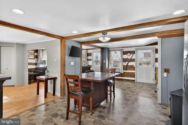 a view of a dining room with furniture