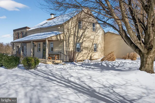 a view of a house with snow on the floor