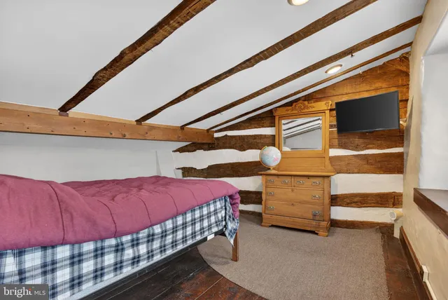 a view of a chairs and table in the patio