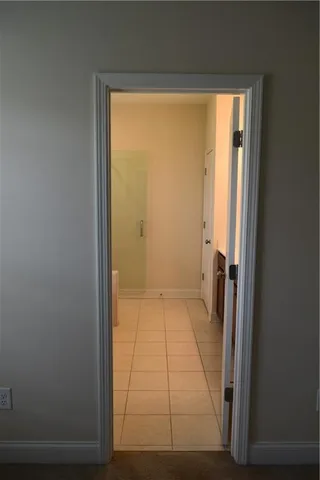 a bathroom with a tub a sink and a shower