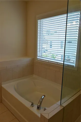 a white toilet sitting next to a small sink