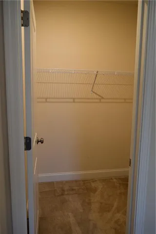 an empty room with a empty space and window