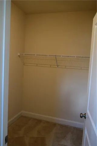 a bathroom with a glass door shower