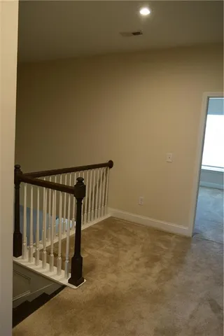 a view of house with yard and front area