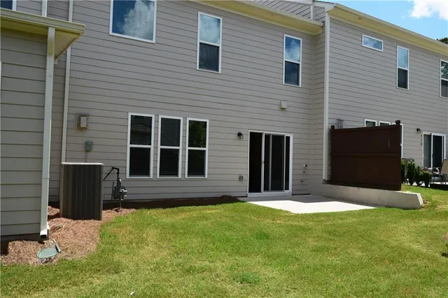 a stove top oven sitting inside of a kitchen