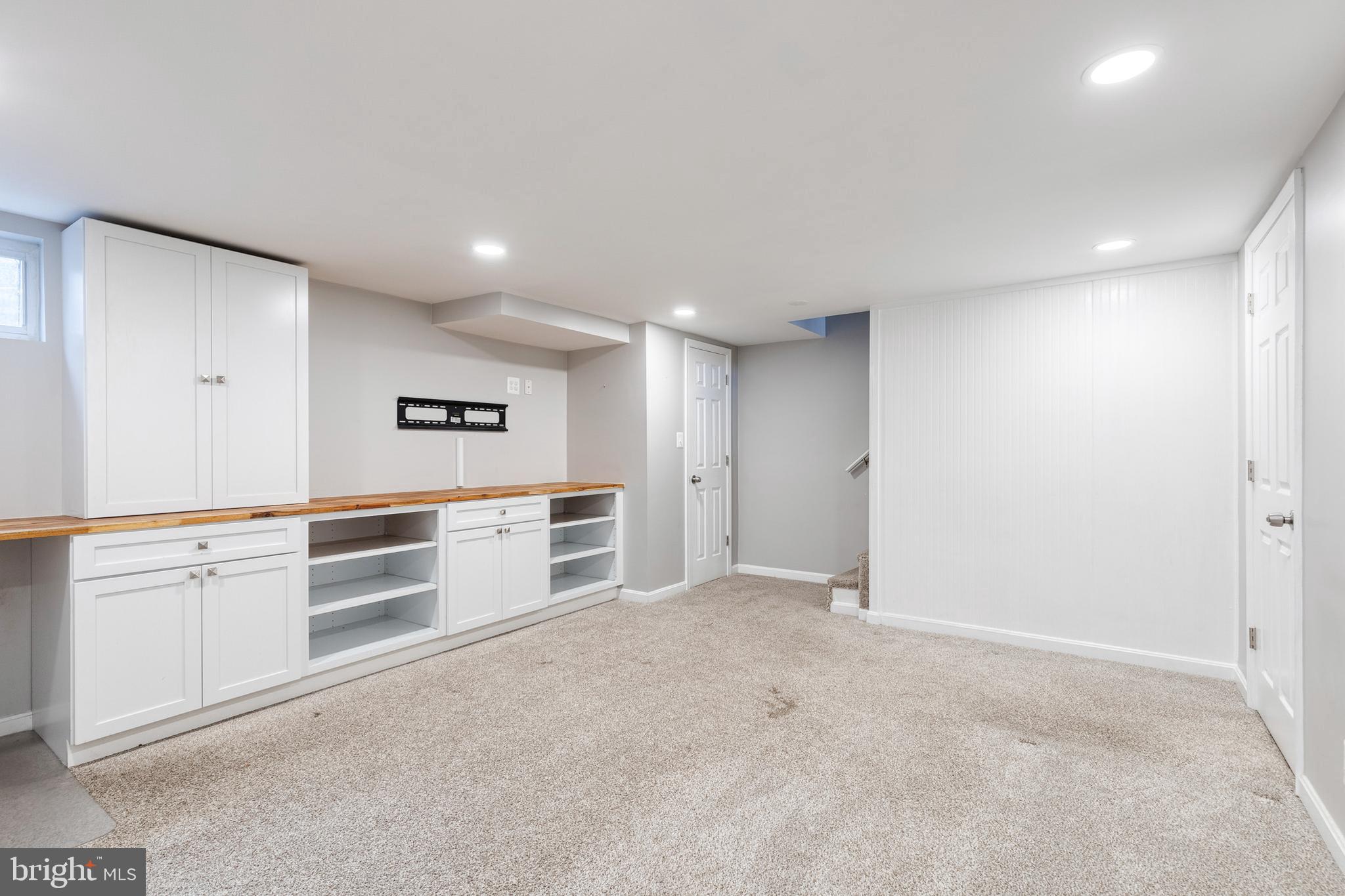 122 Regester Avenue Baltimore, MD 21212 - Photo 29 of 36 a view of a kitchen with white cabinets