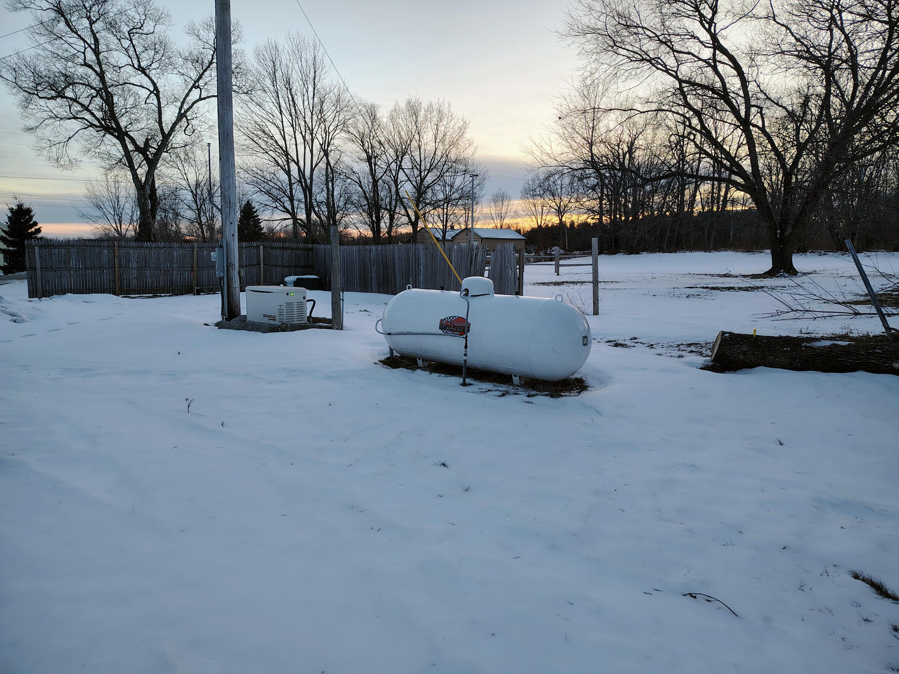 586 Upper-Charleston Road Charleston, ME 04422 - Photo 53 of 64 Propane tank and Generator