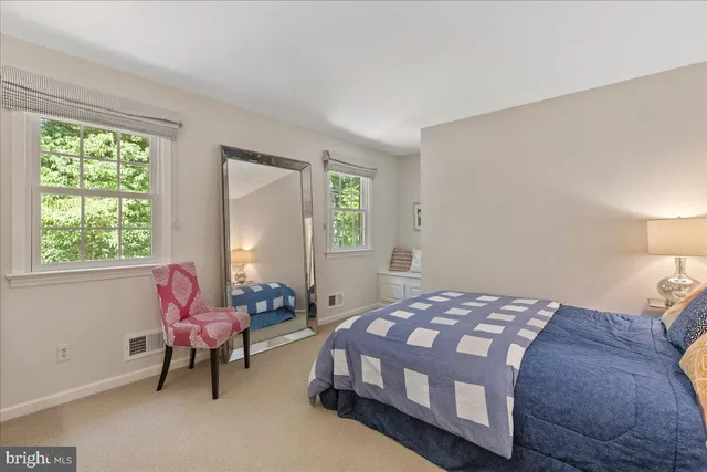 a view of front door with a bench