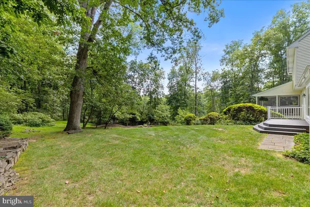 a garden view with a seating space