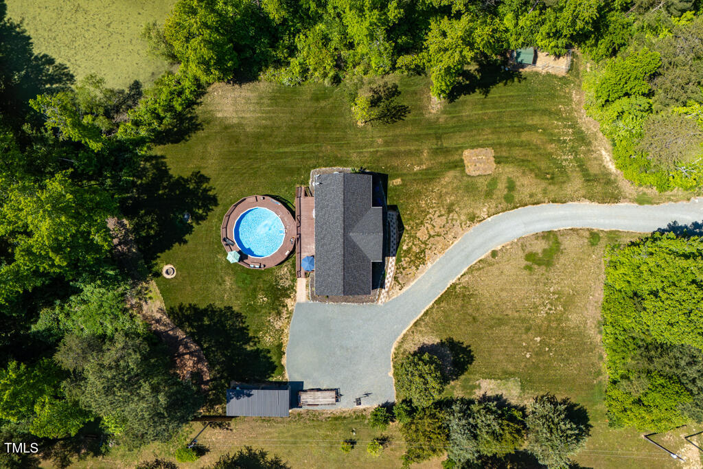 5912 Mt Zion Road Snow Camp, NC 27349 - Photo 10 of 33 a view of a swimming pool with a lake view