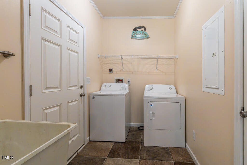 5912 Mt Zion Road Snow Camp, NC 27349 - Photo 16 of 33 a utility room with dryer and washer