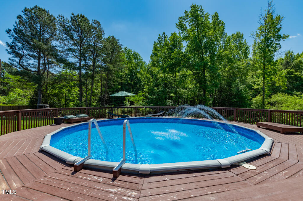 5912 Mt Zion Road Snow Camp, NC 27349 - Photo 31 of 33 a view of a swimming pool with a patio