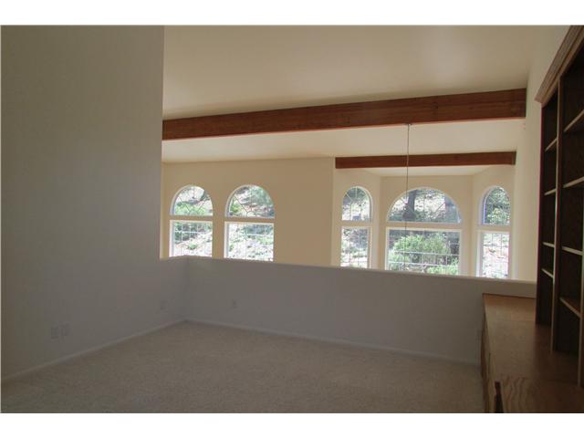 775 East Incense Cedar Road Julian, CA 92036 - Photo 17 of 25 Open wall overlooking living room. Light ceiling fan. Vaulted ceiling.