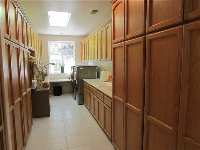 775 East Incense Cedar Road Julian, CA 92036 - Photo 18 of 25 23X8 room. Pantry with pull out drawers. Tile floor. Dryer hookup for electric and propane gas. Tons of storage space. Utility sink. Skylight. Central vacuum system.