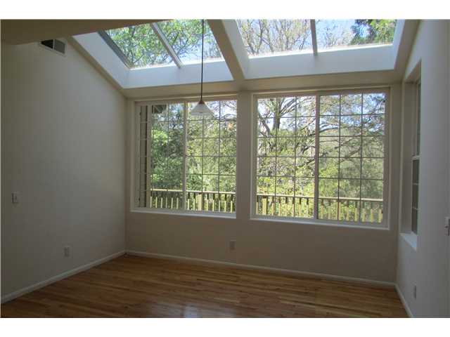 775 East Incense Cedar Road Julian, CA 92036 - Photo 7 of 25 Bright with ceiling windows. Wood floor. Nice view.