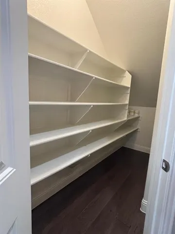 a bathroom with a sink a toilet a mirror and vanity