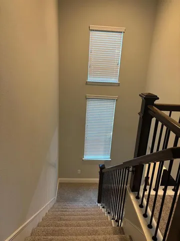a view of entryway with wooden floor