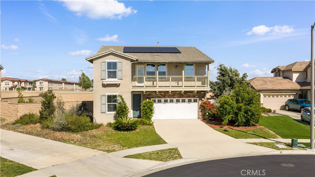 13296 Joliet Drive Rancho Cucamonga, CA 91739 - Photo 40 of 69 a front view of a house with a yard