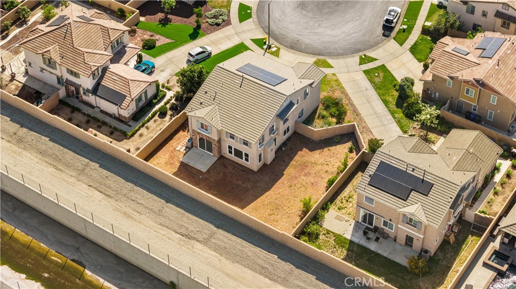 13296 Joliet Drive Rancho Cucamonga, CA 91739 - Photo 44 of 69 an aerial view of a residential apartment building with a yard