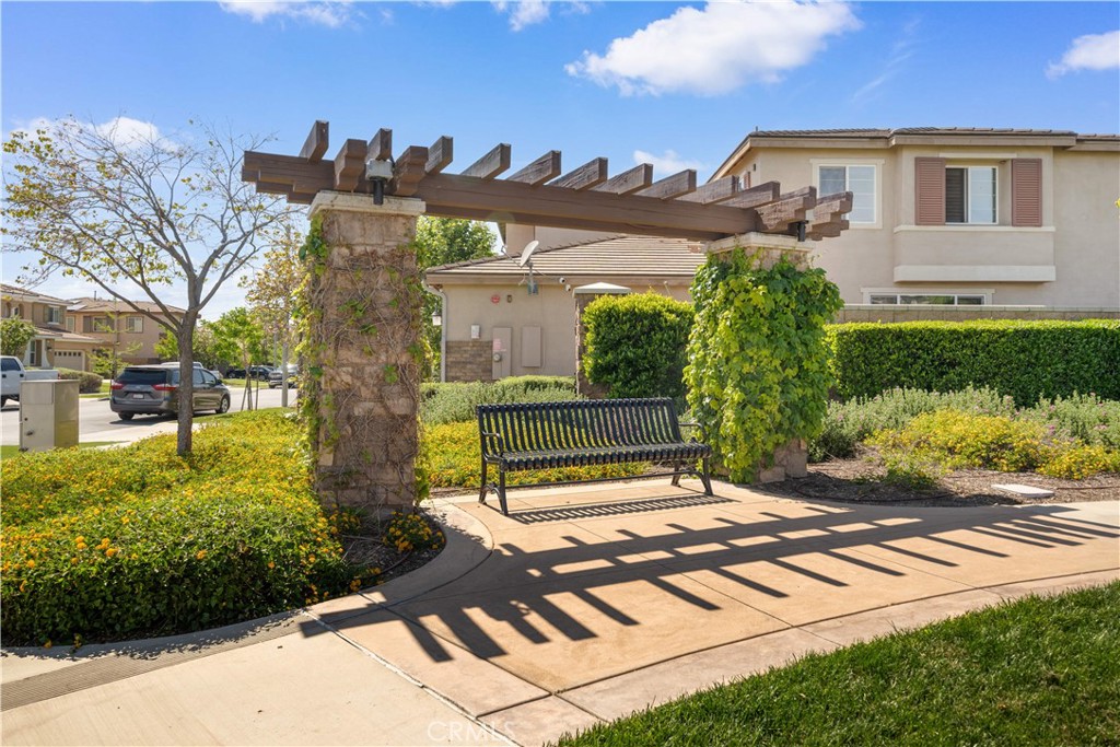 13296 Joliet Drive Rancho Cucamonga, CA 91739 - Photo 57 of 69 a view of a building with a garden