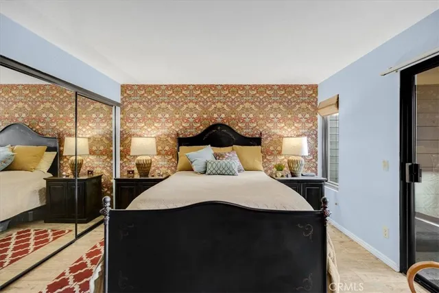 a bedroom with a bed and furniture