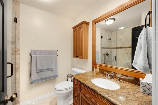 a view of a livingroom with wooden floor and windows