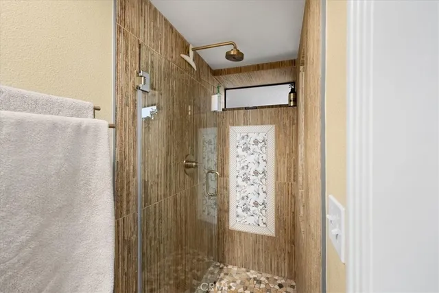 a bathroom with a double vanity sink and mirror